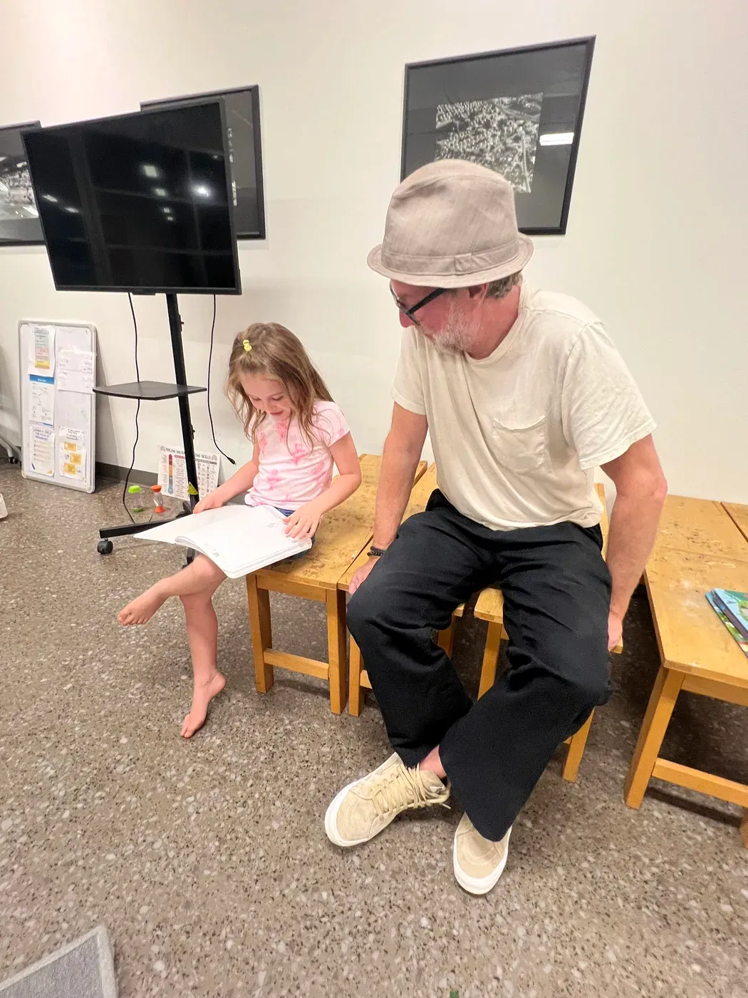 A young learner and a mentor exploring together