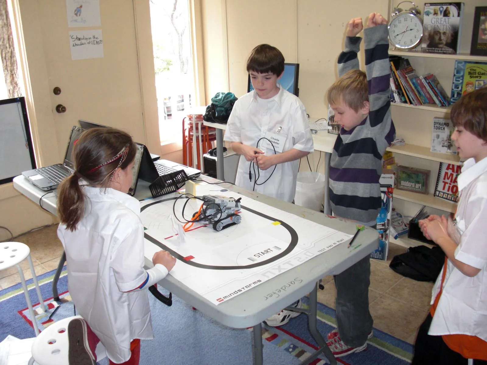 Explorers students working on a robotics project